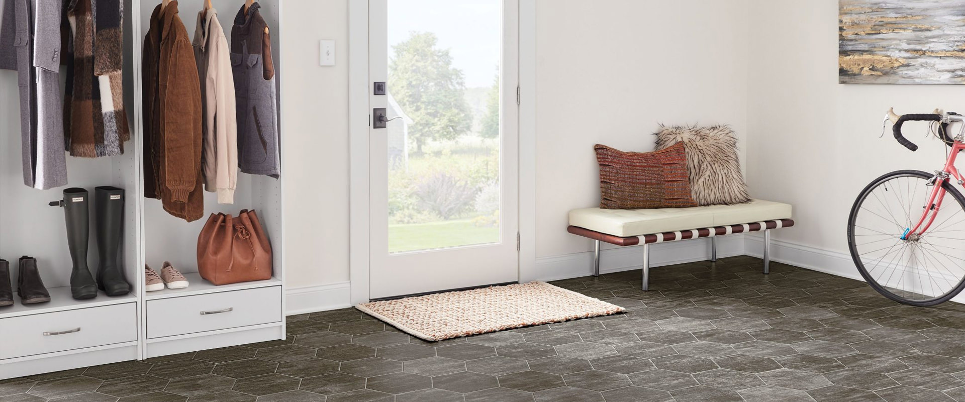 Photo of entryway with hexagonal gray flooring